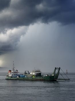Ferry from Java to Bali under the storm. Indonesia