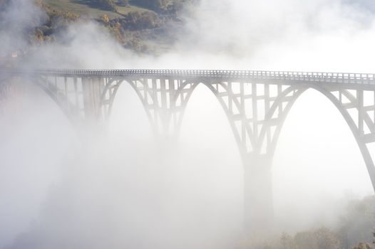 Djurdjevica Tara Bridge is a concrete arch bridge over the Tara River in northern Montenegro. It was built between 1937 and 1940, it's 365m long and the roadway stands 172 metres above the river.