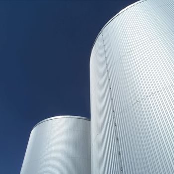 Storage Tanks in front of blue sky