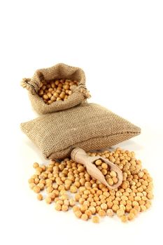 Sacks of dried yellow peas and bushel