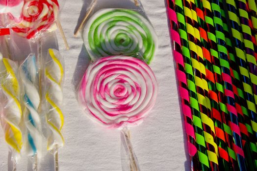 Colorful candy sold in street fair market. Sweets trade field.