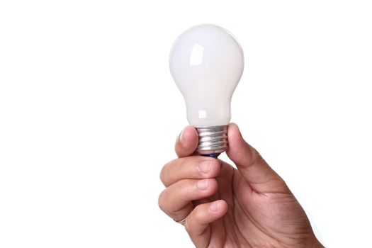 Lightbulb in a hand isolated on white background. 