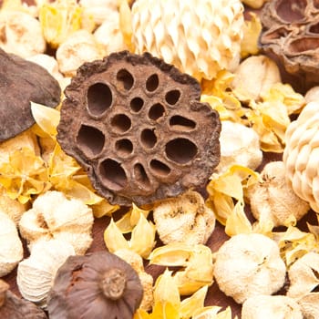 Pot pourri as a background image on a wooden surface