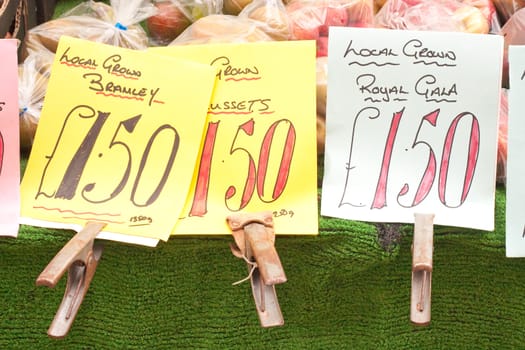 Types of apples for sale at an english market stall