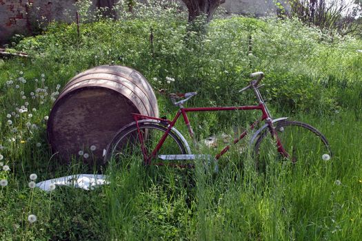 Red bike and barrel