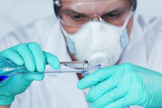 Chemistry Scientist conducting experiments in laboratory