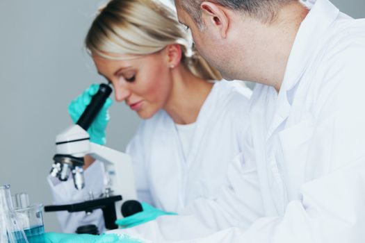 Chemistry Scientist conducting experiments in laboratory