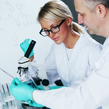 Chemistry Scientist conducting experiments in laboratory