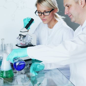 Chemistry Scientist conducting experiments in laboratory