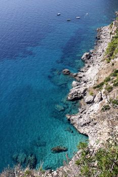 The coastline of the island of Capri, which is off Sorrentine peninsula in the Bay of Naples, Italy.
