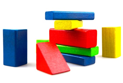 Wooden building blocks isolated on white background
