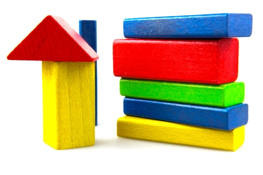 Wooden building blocks isolated on white background