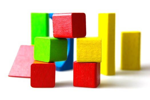 Wooden building blocks isolated on white background