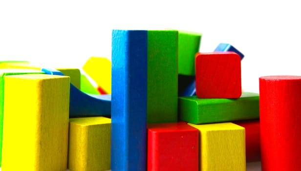 Wooden building blocks isolated on white background