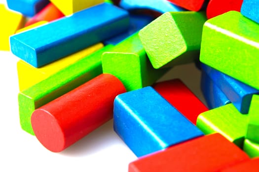 Wooden building blocks isolated on white background