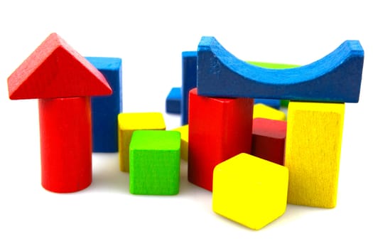 Wooden building blocks isolated on white background