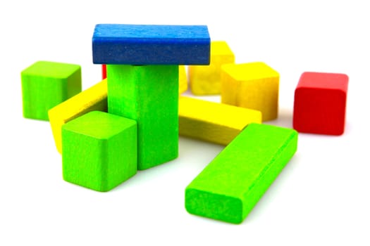 Wooden building blocks isolated on white background