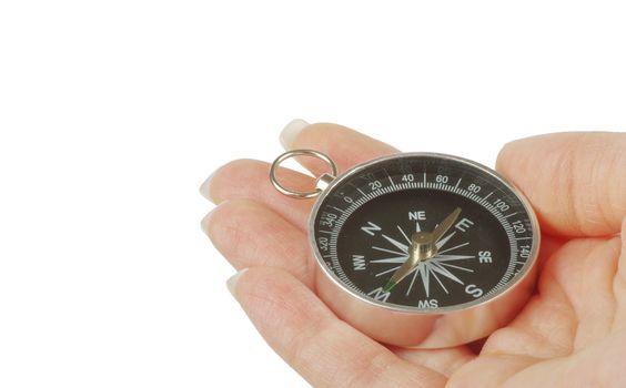 Compass in a hand isolated on the white