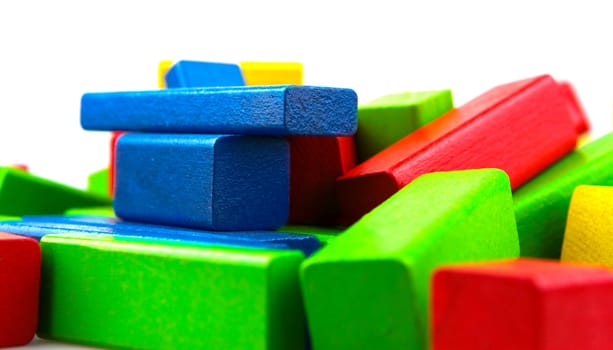 Wooden building blocks isolated on white background