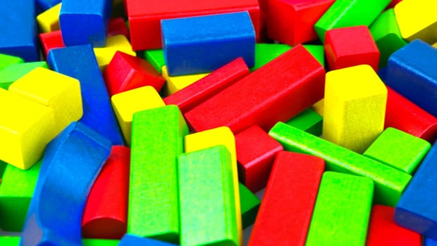 Wooden building blocks isolated on white background