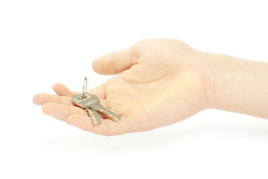 hand holds a key isolated on white