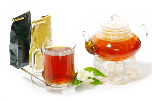 Tea being poured into glass tea cup
