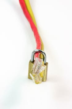 computer and connections safe data transfer concept with two ethenet cables red and yellow and a locked padlock isolated on white vertical