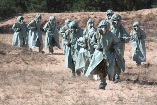 Group of people in protective suits