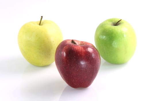 three apples yellow, green and red isolated diet healthy food and agriculture concepts