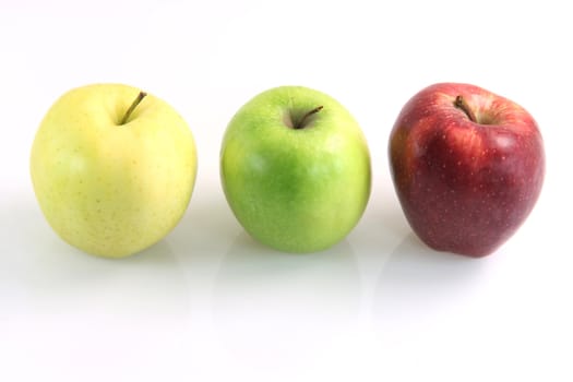 three apples yellow, green and red isolated diet healthy food and agriculture concepts