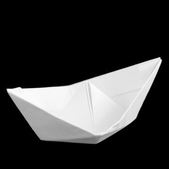 Paper boat - simple origami on a black background