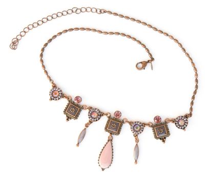 Magnificent precious necklace on a white background