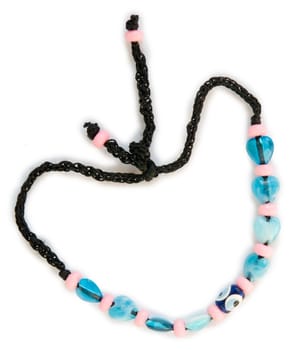 This is a blue bead necklace in the shape of a heart.
