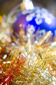Colorful christmas decoration on a shiny background