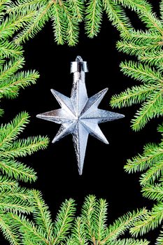 silver star on black background,Christmas bauble
