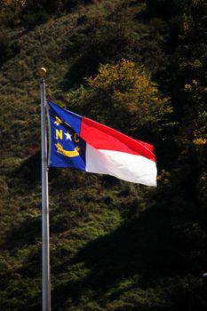 North Carolina and flag blowing in the breeze