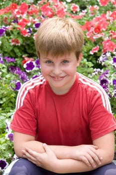 Portrait of a boy with a pleased smile upon one's face