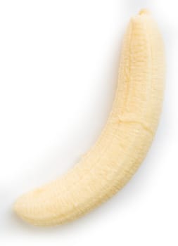 one ripe banana on a white background
