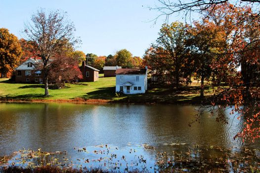 An old lake house during the fall of year