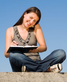 girl writes to writing-books and speaks by phone