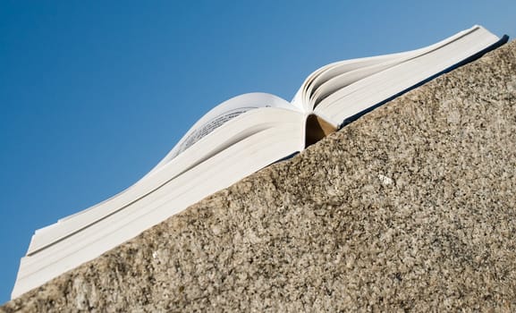 The open book with sky at background