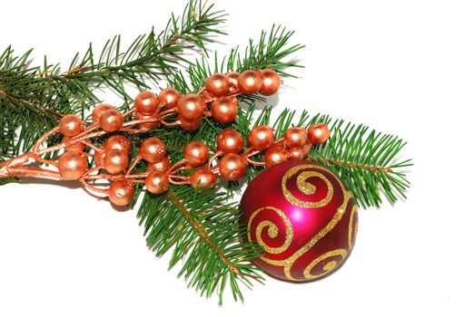 Christmas composition with gold berry, pine and red ball ornament isolated on the white.
