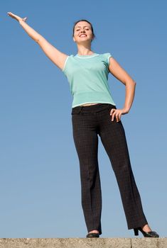 beautiful girl stretches the hand upwards