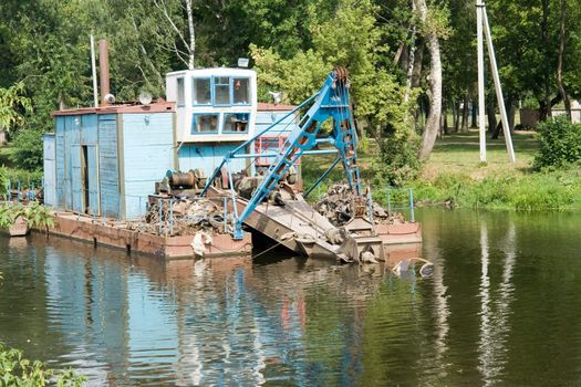Equipment for cleaning of river-bed