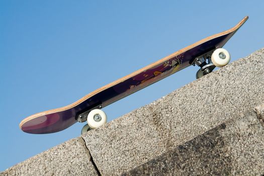 Skate board with blue sky at background