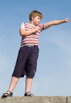 fighter boy with blue sky at background