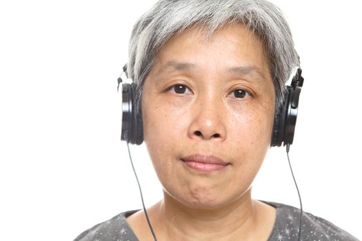 mature woman listen music