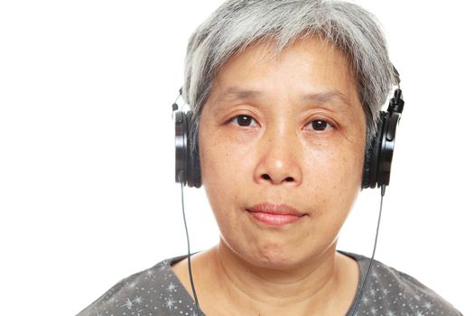 mature woman listen music