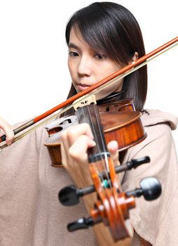 Young woman play violin