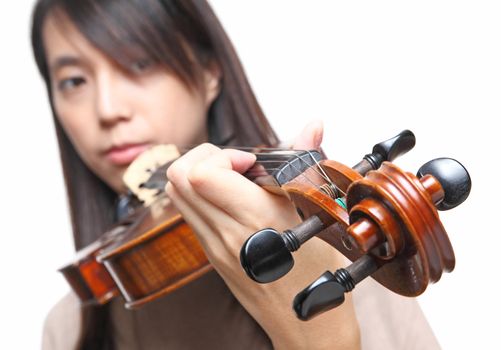 Young woman playing violin